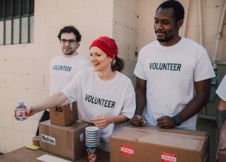 Three People Donating Goods